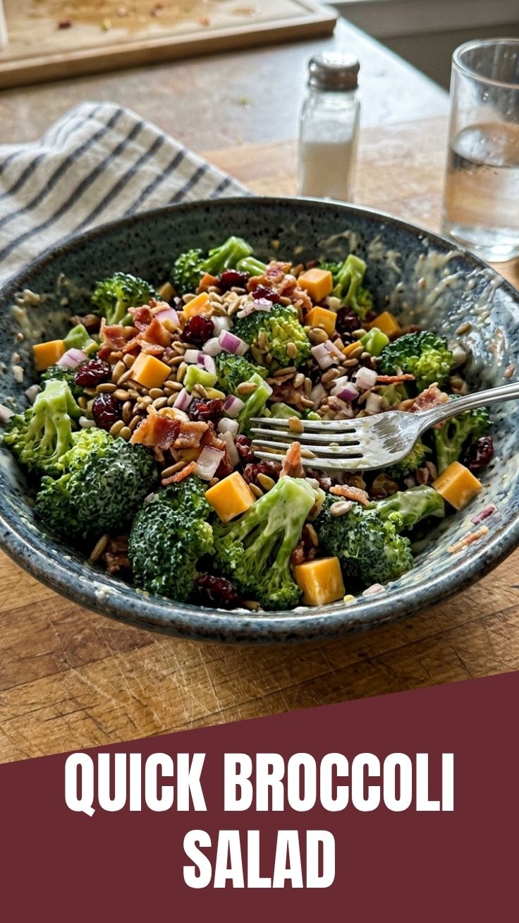 Classic Broccoli Salad with bacon and cranberries in a white bowl