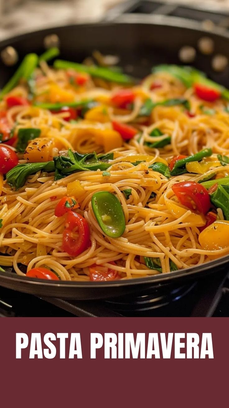A colorful bowl of fresh Pasta Primavera with assorted vegetables