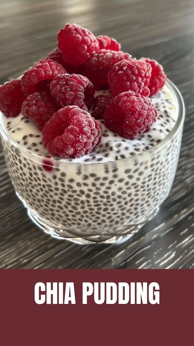 A bowl of healthy chia pudding, topped with fresh berries and nuts.