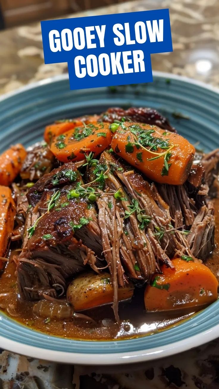 A slow cooker pot roast with carrots, potatoes, and herbs