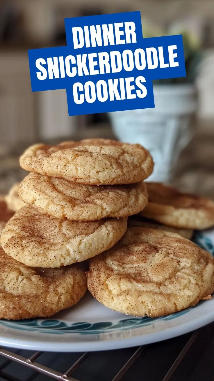 A plate of freshly baked snickerdoodle cookies, warm and crinkled with cinnamon sugar.