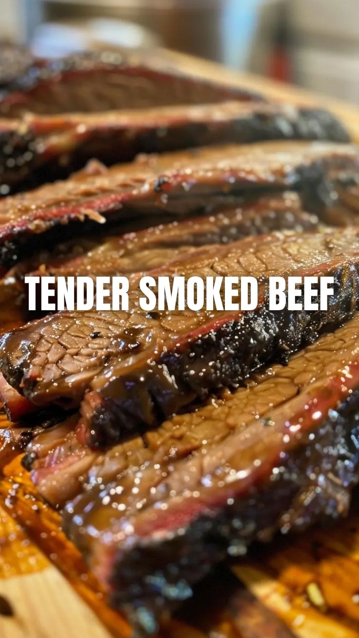 A thick, juicy cut of Texas style BBQ brisket with a perfect smoke ring
