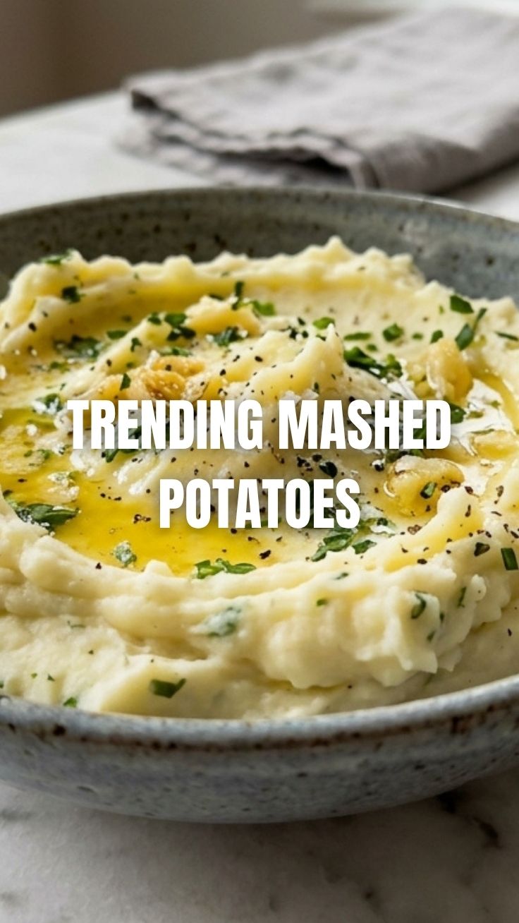 A bowl of fluffy garlic mashed potatoes, ready to serve.